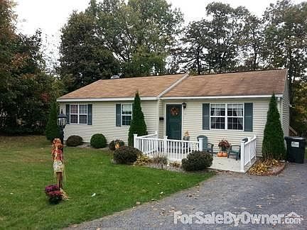 Tons of Curbside Appeal! : Great front yard! Beautiful porch with Trex decking. Vinyl posts.