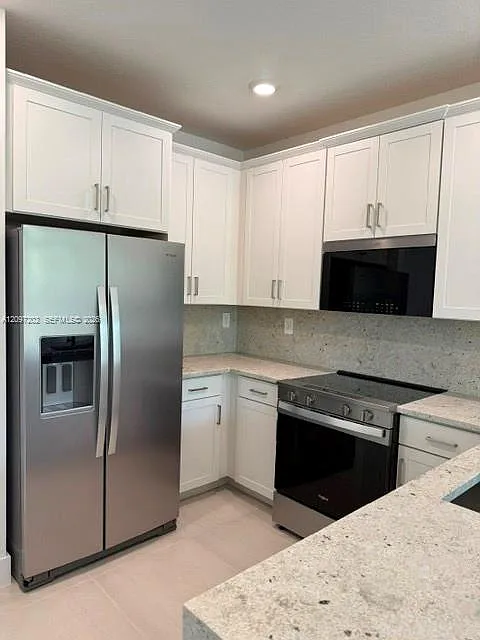 7263 SW 46th St — Photo 3