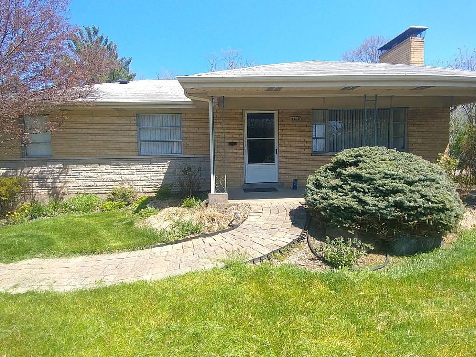 front, driveway is towards left. drive around back for garag