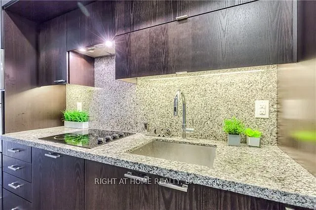 120 Harrison Garden Blvd #716 — Photo 11