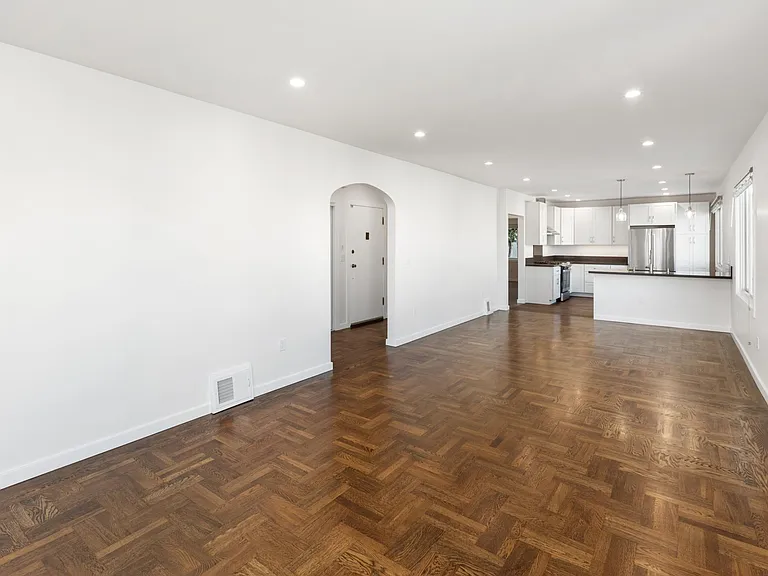 Open floor plan with kitchen, dining room, living room