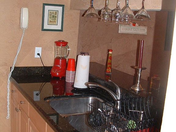 Wood cabinets and stainless steel appliances