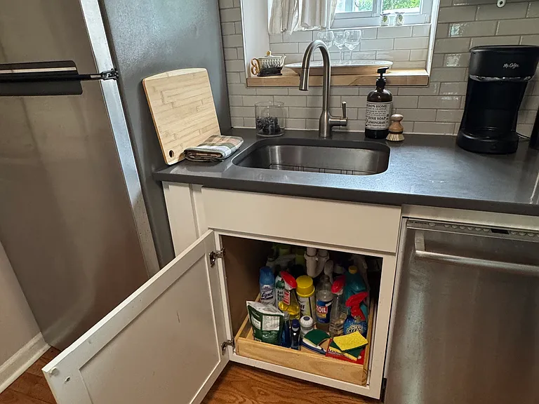 Kitchen sink storage.