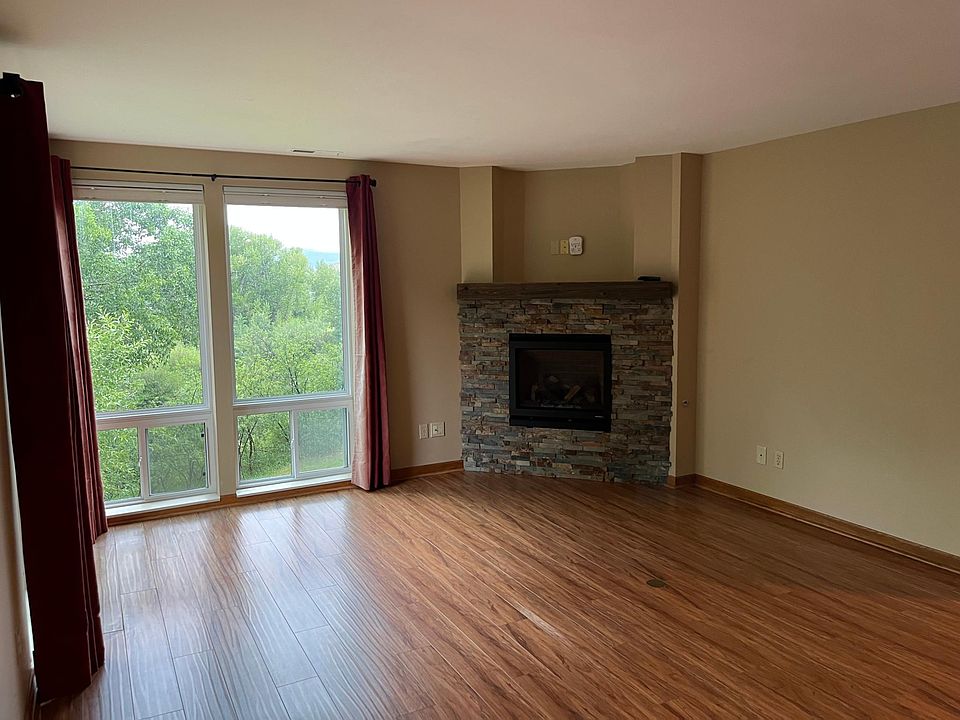 Gas fireplace and views of the Eagle River