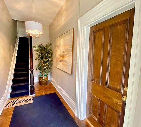 Shared formal entry, unit front door to right