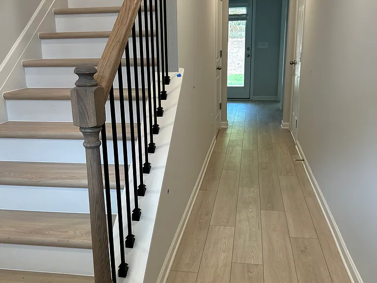 First floor hallway to bedroom / patio