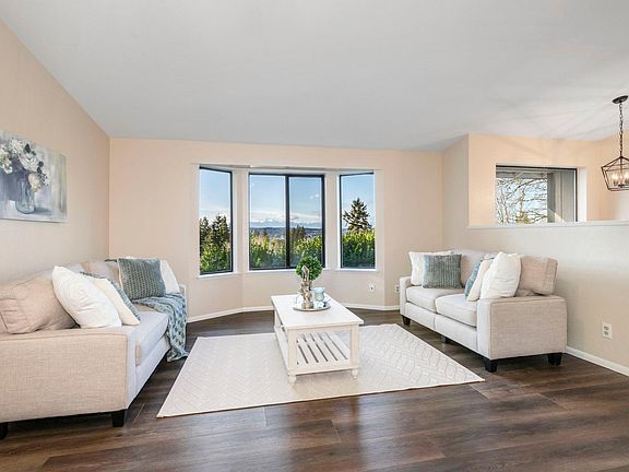 This west-facing home enjoys incredible views of the Olympic Mountains and Dyes Inlet.