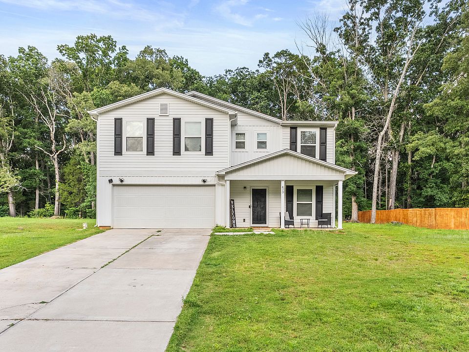 Front view of home and yard