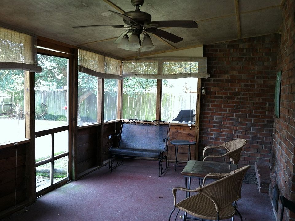 large screened back porch