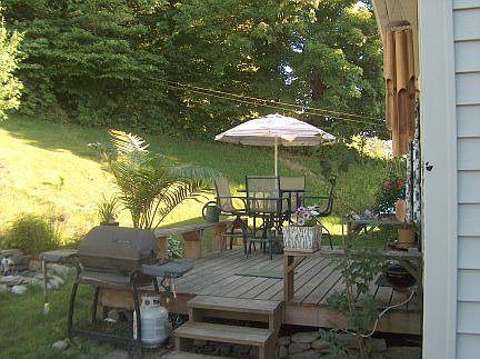 Rear deck for summer barbeques.