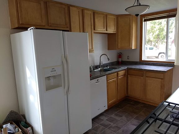 Kitchen with fridge.