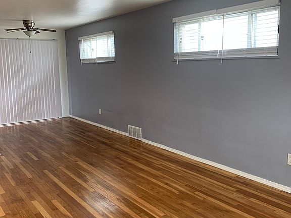 Living Room with fresh light grey accent wall