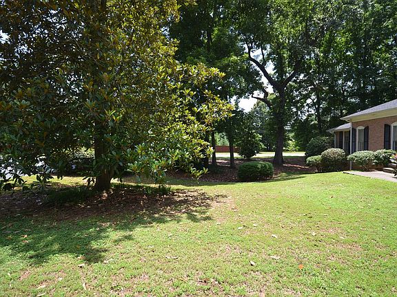 Almost 1 acre level lot in Walton HIgh School district