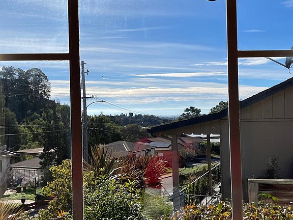 view from living room can see all the way to the peninsula.