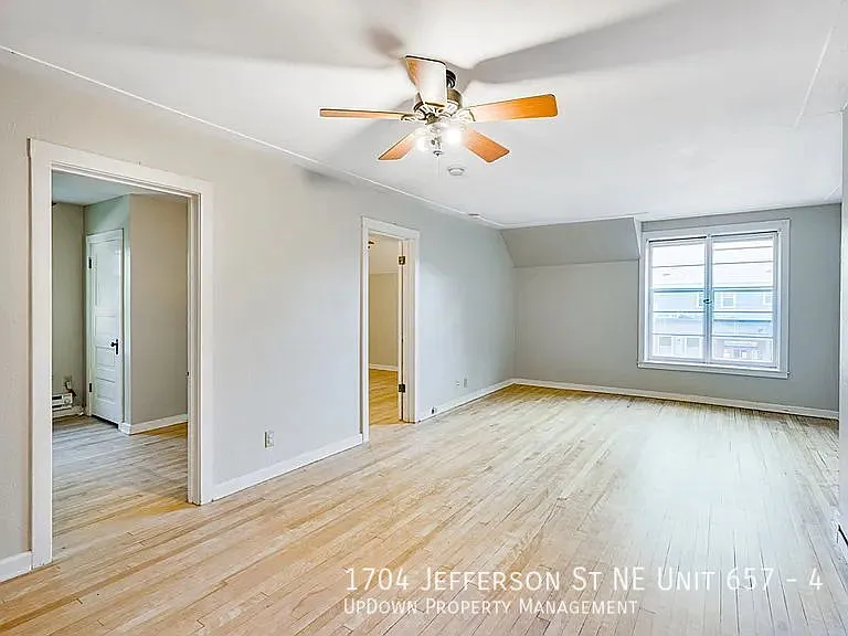 "Chic 2-Bed Retreat with Gleaming Hardwood Floors in the Heart of Minneapolis!" — Photo 4