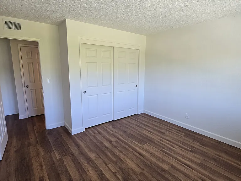 Actual bedroom showing large closet.
