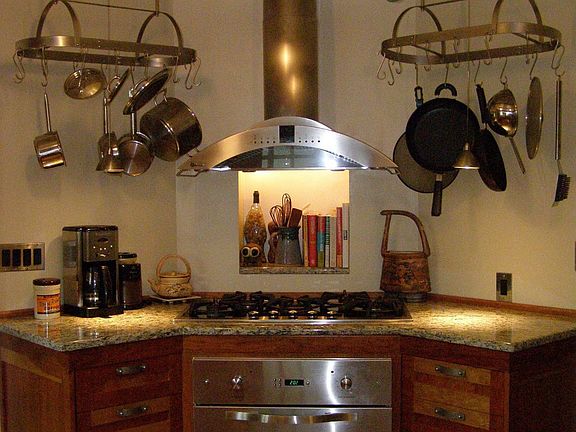Custom Kitchen with Cherry cabinets, Viking cooktop and oven, custom lighting