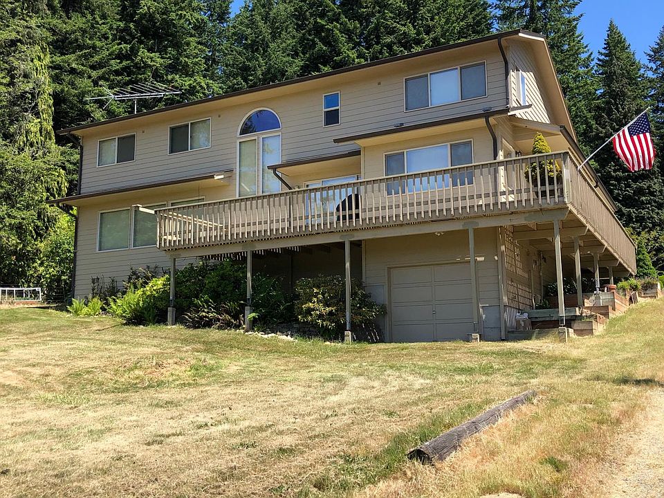 Enjoy water and mountain views from nearly every room in this home.