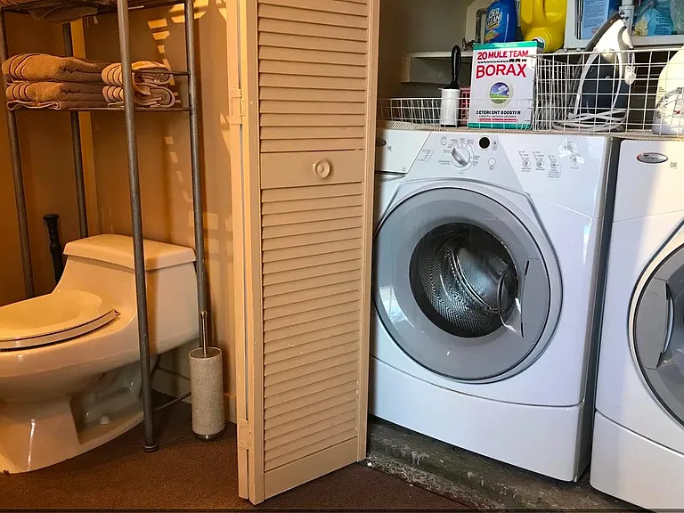 Entry level bathroom and laundry area.