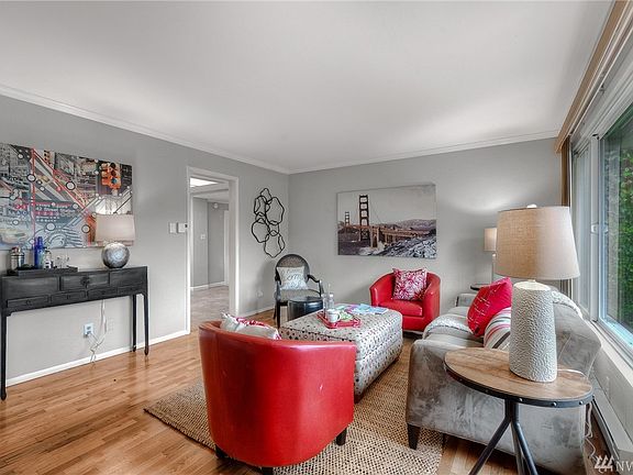 Original hardwoods in the spacious living room.