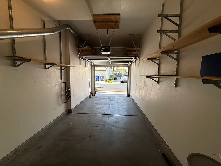 Single car garage. There is also a dedicated outdoor parking spot.