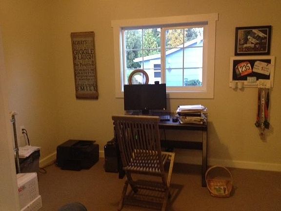 1 of the 3 bedrooms, new carpet, trim and paint