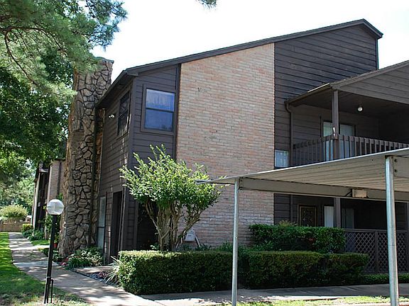 In addition to the lighted pathways, a gorgeous stone chimney adds a touch of elegance to this fine 