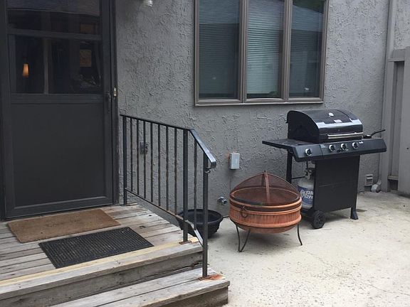 Area between front door and garage.