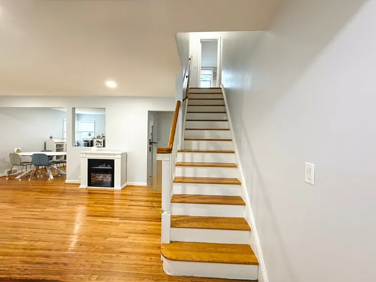 Hardwood Floors throughout and stairs to 2nd floor bedrooms