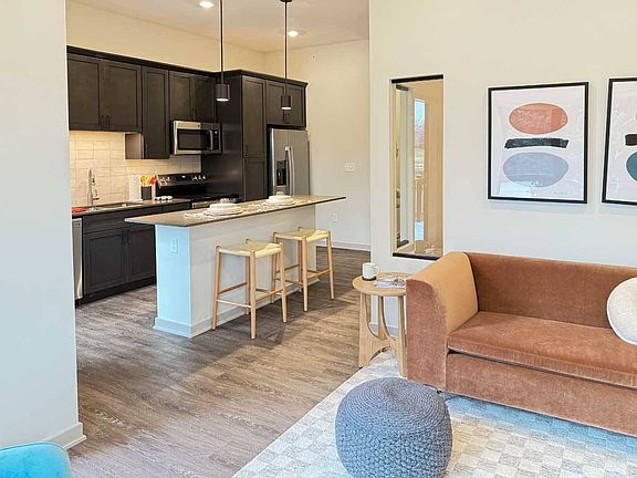 Experience the seamless flow of our Fox studio apartment, where the stylish kitchen opens up to a cozy living areaperfect for cooking, dining, and relaxing in comfort.