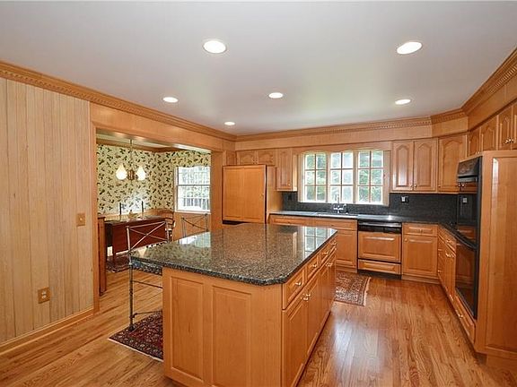 Updated kitchen features granite counter tops