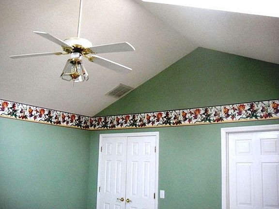 master w/skylightpvaluted ceiling