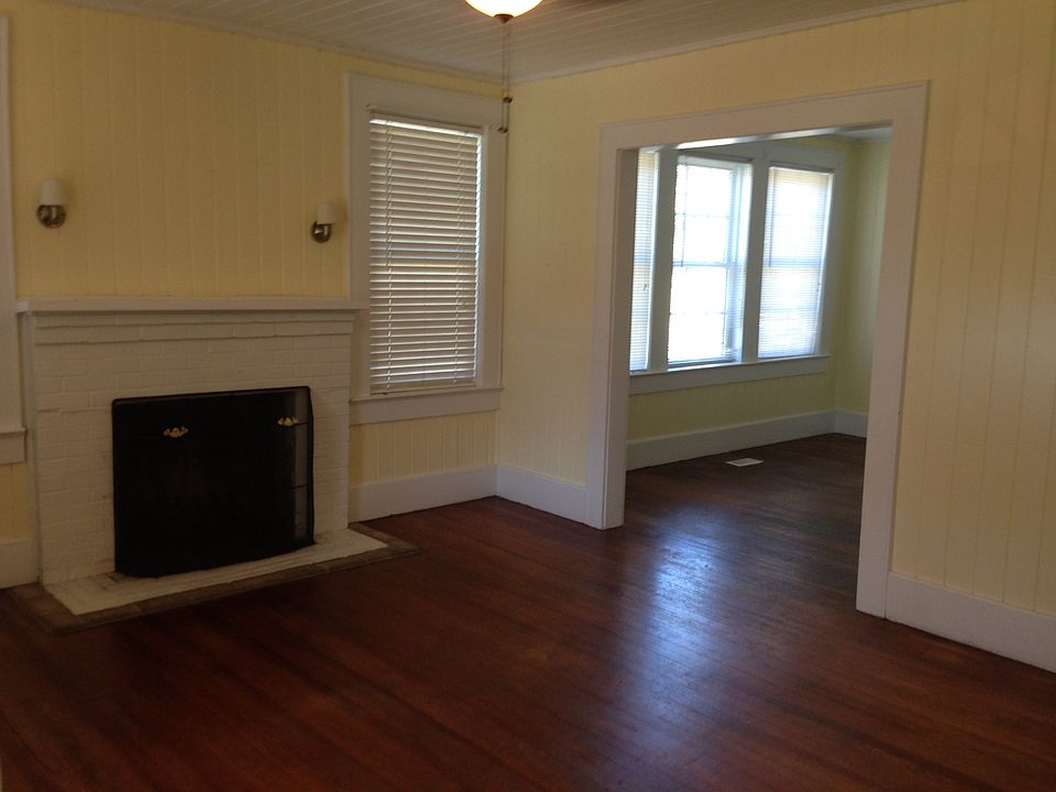 Living room w/fireplace & dining room