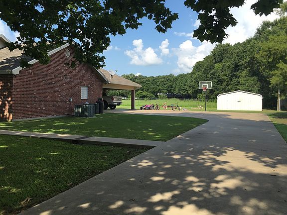 Carport and 21' x 21' shed