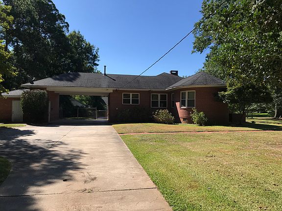 Crescent side view Carport 