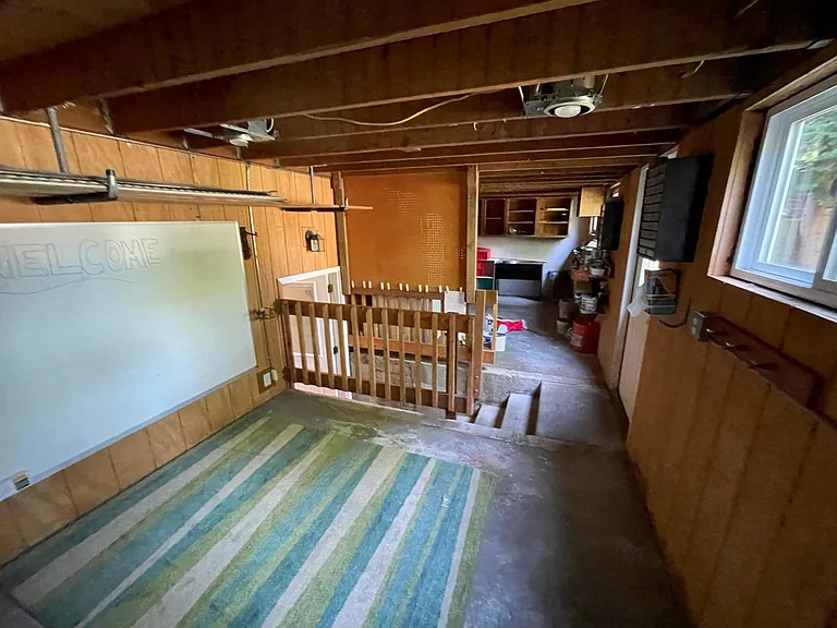 art space in insulated storage area leading to back yard