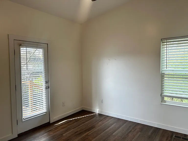 Bedroom 2 has access to private balcony.