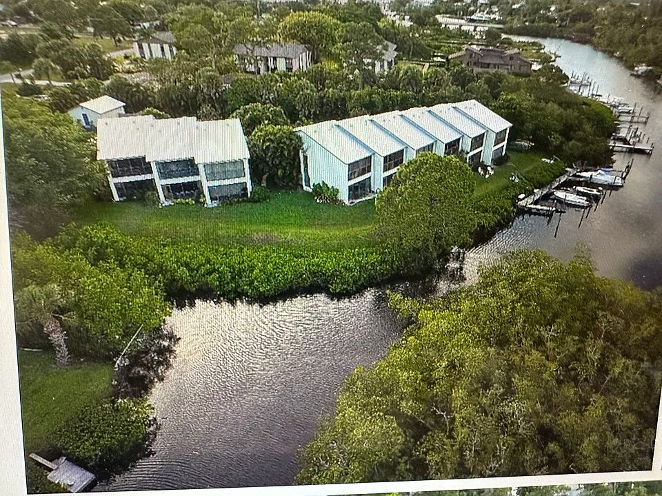 Waterfront Townhome with deeded dock for 22' boat. Minutes from the St Lucie Inlet in the Port St Lucie Waterfront District. Small dog (under 40#) welcome. Townhouse is the middle on in the three unit building. Furnished or Unfurnished for same rent.