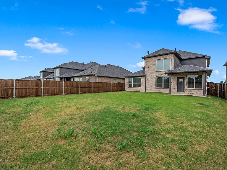 Large backyard with patio