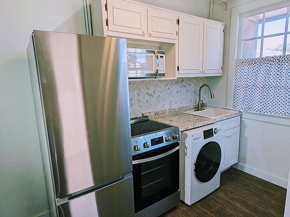 European style kitchen, complete with upgraded new kitchen appliances, perfect for all your cooking needs.