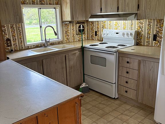 Kitchen with lots of storage and open to family room.