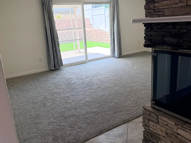 Living room,sliding doors to patio and backyard