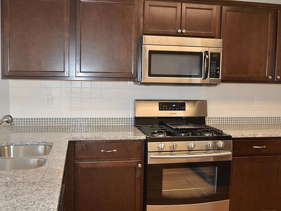 Kitchen with slide in gas range & oven/Dishwasher /Refrigerator