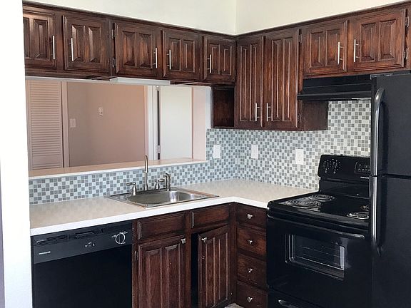 Large kitchen with plenty of cabinets.