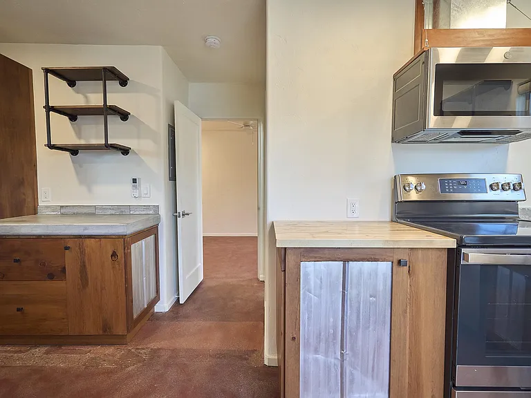 KITCHEN PASSAGE TO BATHROOM & LIVING SPACE