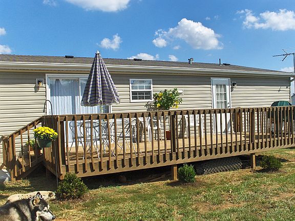 Back deck fenced backyard