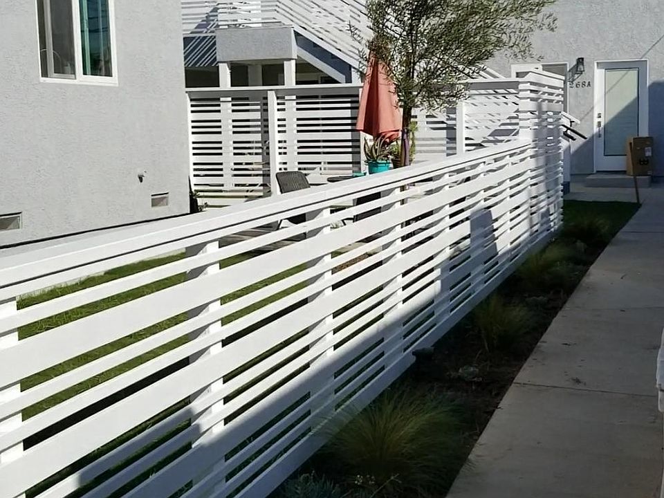 walkway from front on Prospect to back house with upstairs unit for rent.