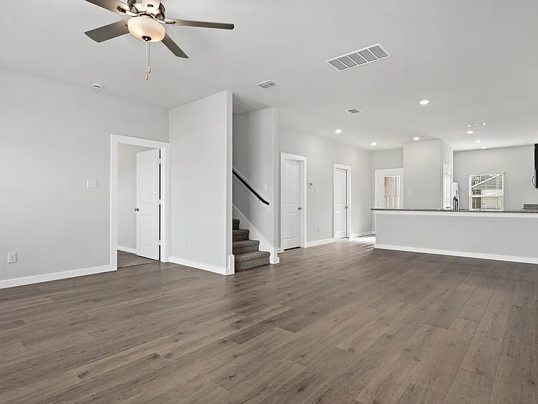 The Cottonwood has an open layout that connects the kitchen, dining room, and family room.