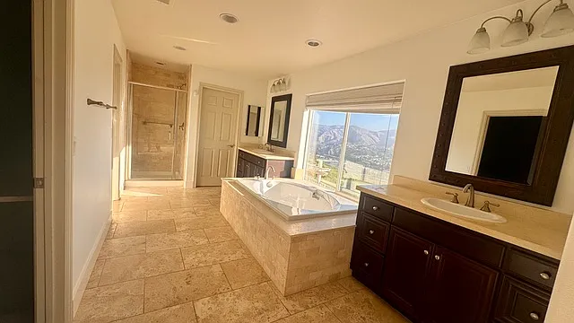 Master Bathroom with tub and walk in shower
