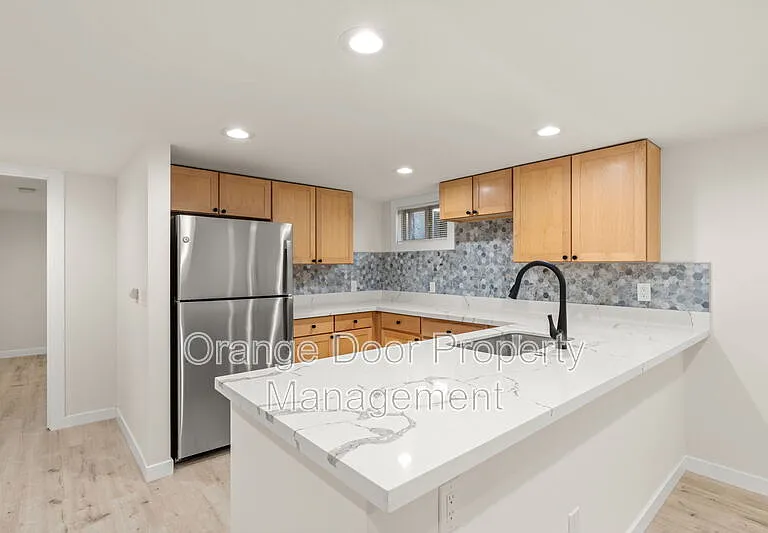 7727 Jones Ave NW — Photo 14